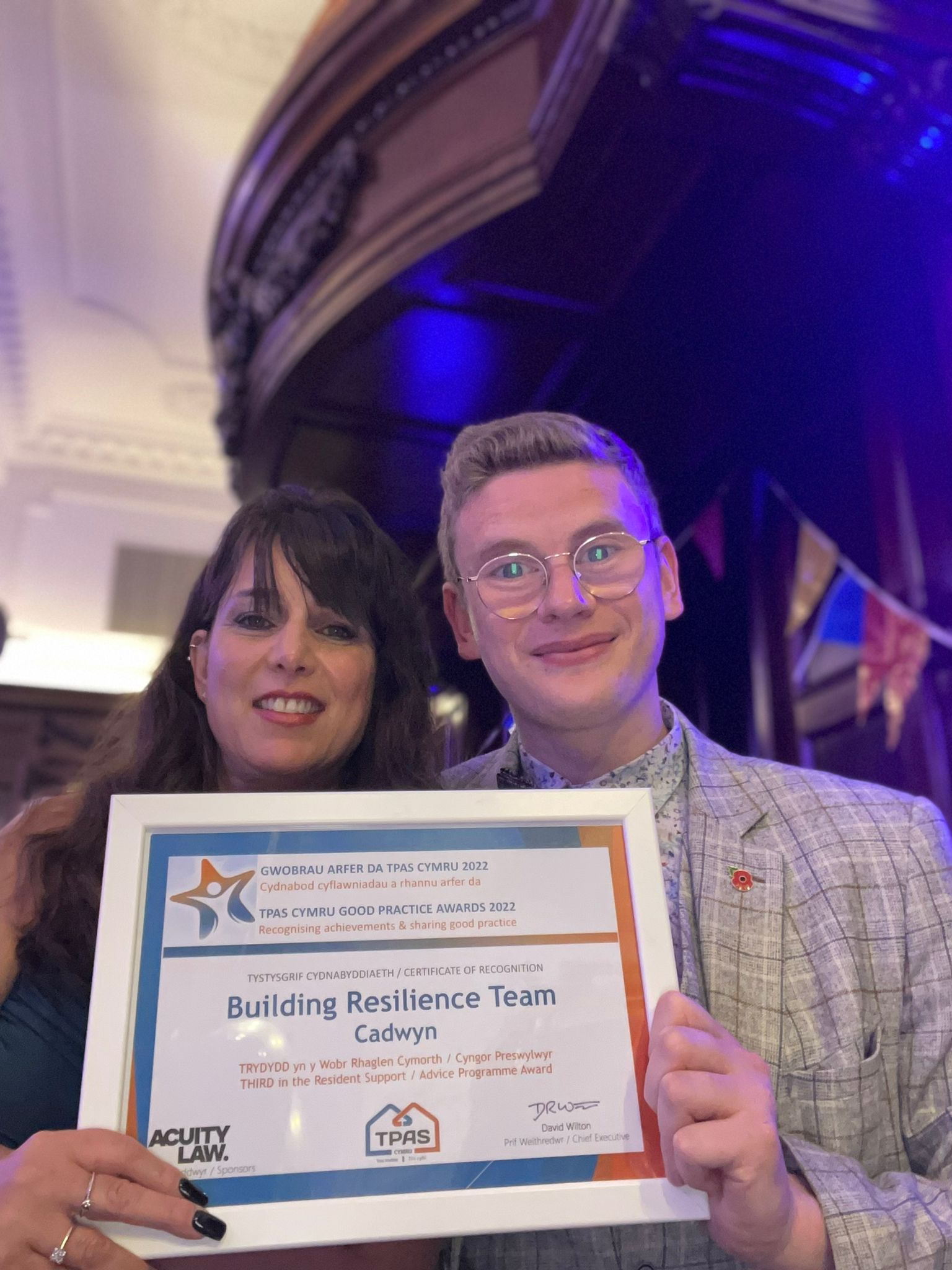 Staff receiving award on behalf of Cadwyn
