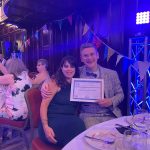 Staff receiving award on behalf of Cadwyn